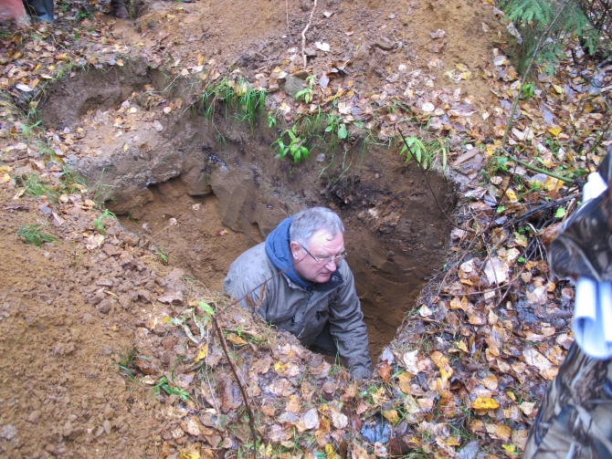 V.S. Stolbovoy, Dr.Sc. (Geography), from Moscow is evaluating the changes of the soil profile on the former skidding road after 30 years since logging